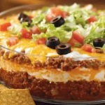 Why does my taco dip get watery? Classic taco dip close-up