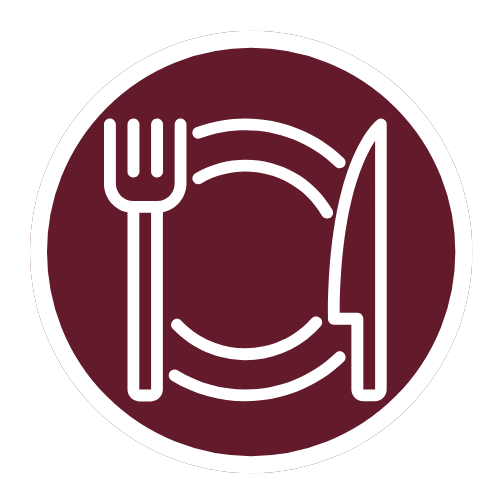 Icon of a plate with a fork and knife outlined in white on a maroon circle background.